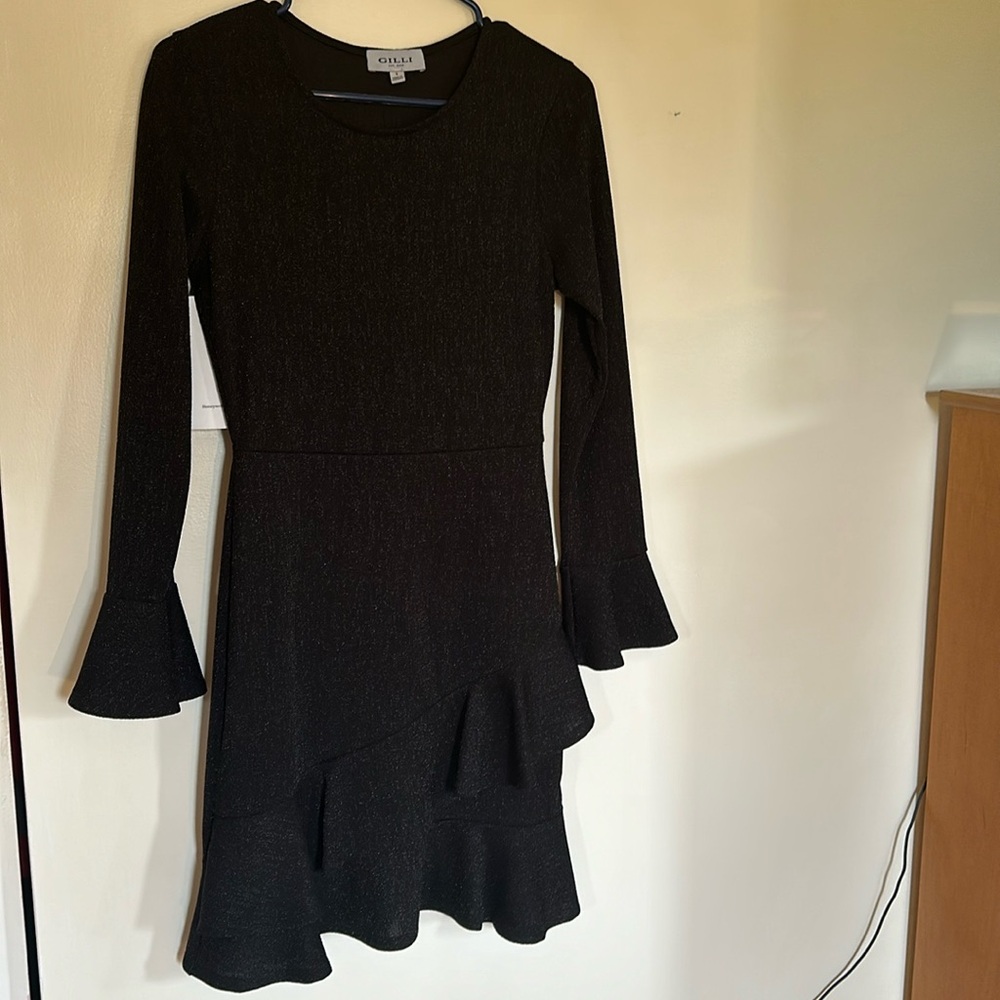Gilli size small sparkle black dress with tiered bottom and bell sleeves.